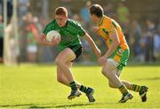 21 September 2013; Sean Donan, Castlewellen, Down, in action against Gary Sice, Corofin, Galway, during the 2013 FBD 7s semi-final at Kilmacud Crokes GAA Club. The competition, now in its 41st year, attracted top club teams from all over Ireland and provided a day of fantastic football for GAA fans. Kilmacud Crokes GAA Club, Stillorgan, Co. Dublin. Picture credit: Barry Cregg / SPORTSFILE