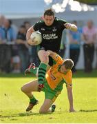 21 September 2013; Kevin Duffin, Castlewellen, Down, in action against Barry Donovan, Corofin, Galway, during the 2013 FBD 7s semi-final at Kilmacud Crokes GAA Club. The competition, now in its 41st year, attracted top club teams from all over Ireland and provided a day of fantastic football for GAA fans. Kilmacud Crokes GAA Club, Stillorgan, Co. Dublin. Picture credit: Barry Cregg / SPORTSFILE
