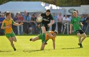 21 September 2013; Kevin Duffin, Castlewellen, Down, in action against Barry Donovan, Corofin, Galway, during the 2013 FBD 7s semi-final at Kilmacud Crokes GAA Club. The competition, now in its 41st year, attracted top club teams from all over Ireland and provided a day of fantastic football for GAA fans. Kilmacud Crokes GAA Club, Stillorgan, Co. Dublin. Picture credit: Barry Cregg / SPORTSFILE