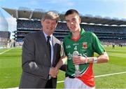22 September 2013; Mayo's David Kenny is presented with the Man of the Match award by Pat O'Doherty, Chief Executive, Electric Ireland. Electric Ireland GAA Football All-Ireland Minor Championship Final, Tyrone v Mayo, Croke Park, Dublin. Picture credit: Brendan Moran / SPORTSFILE