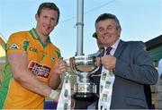 21 September 2013; Corofin, Galway, captain receives the cup from Chairman of the Leinster Council Martin Skelly after the game during the 2013 FBD 7s at Kilmacud Crokes GAA Club. The competition, now in its 41st year, attracted top club teams from all over Ireland and provided a day of fantastic football for GAA fans. Kilmacud Crokes GAA Club, Stillorgan, Co. Dublin. Picture credit: Barry Cregg / SPORTSFILE