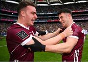 14 July 2024; Galway players Daniel Ó Flaherty, left, and Tomo Culhane celebrate after their side's victory in the GAA Football All-Ireland Senior Championship semi-final match between Donegal and Galway at Croke Park in Dublin. Photo by Seb Daly/Sportsfile