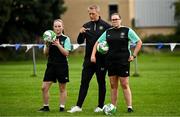 15 July 2024; Republic of Ireland manager Heimir Hallgrímsson with coaches Chloe Lawless, left, and Darby Moore during a visit to a FAI football camp at Verona FC in Blanchardstown, Dublin. Photo by Harry Murphy/Sportsfile