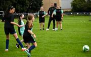 15 July 2024; Republic of Ireland manager Heimir Hallgrímsson with coaches Chloe Lawless, left, and Darby Moore during a visit to a FAI football camp at Verona FC in Blanchardstown, Dublin. Photo by Harry Murphy/Sportsfile