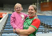 18 July 2024; Faye Cahill, on her 9th birthday, with her mother Lisa Cahill from Mullinahone, Tipperary, during the LGFA 50th Anniversary Mini-Games at Semple Stadium in Thurles. Photo by Stephen Marken/Sportsfile