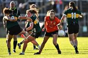 20 July 2024; Caroline O'Hanlon of Armagh in action against Kerry players, from left, Emma Dineen, Síofra O'Shea and Danielle O'Leary during the TG4 All-Ireland Ladies Football Senior Championship semi-final match between Armagh and Kerry at Glenisk O’Connor Park in Tullamore, Offaly. Photo by Piaras Ó Mídheach/Sportsfile
