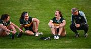 20 July 2024; Kerry joint-manager Declan Quill speaks with his players, from left, Mary O'Connell, Emma Dineen and Kayleigh Cronin after the TG4 All-Ireland Ladies Football Senior Championship semi-final match between Armagh and Kerry at Glenisk O’Connor Park in Tullamore, Offaly. Photo by Piaras Ó Mídheach/Sportsfile