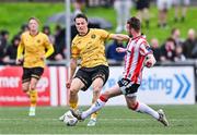 21 July 2024; Carl Axel Sjoberg of St Patrick's Athletic in action against Cameron Dummigan of Derry City during the Sports Direct Men’s FAI Cup second round match between Derry City and St Patrick’s Athletic at the Ryan McBride Brandywell Stadium in Derry. Photo by Ben McShane/Sportsfile