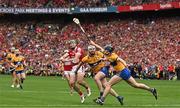 21 July 2024; Robbie O'Flynn of Cork shoots wide late in extra time whilst under pressure from Conor Leen and David McInerney of Clare during the GAA Hurling All-Ireland Senior Championship Final between Clare and Cork at Croke Park in Dublin. Photo by Sam Barnes/Sportsfile