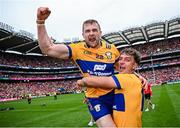21 July 2024; Clare players Seadna Morey, left, and Peter Duggan celebrate after their side's victory in the GAA Hurling All-Ireland Senior Championship Final match between Clare and Cork at Croke Park in Dublin. Photo by Seb Daly/Sportsfile