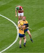 21 July 2024; John Conlon, right, and Shane Meehan of Clare and Robbie O'Flynn of Cork react at the final whistle of the GAA Hurling All-Ireland Senior Championship Final between Clare and Cork at Croke Park in Dublin. Photo by Daire Brennan/Sportsfile