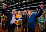 21 July 2024; Clare captain Tony Kelly and manager Brian Lohan celebrate with the Liam MacCarthy cup, Tony Considine, left, and Ger Loughnane, right, after the GAA Hurling All-Ireland Senior Championship Final between Clare and Cork at Croke Park in Dublin. Photo by Stephen McCarthy/Sportsfile