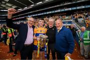 21 July 2024; Clare captain Tony Kelly and manager Brian Lohan celebrate with the Liam MacCarthy cup, Tony Considine, left, and Ger Loughnane, right, after the GAA Hurling All-Ireland Senior Championship Final between Clare and Cork at Croke Park in Dublin. Photo by Stephen McCarthy/Sportsfile