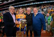 21 July 2024; Clare captain Tony Kelly and manager Brian Lohan celebrate with the Liam MacCarthy cup, Tony Considine, left, and Ger Loughnane, right, after the GAA Hurling All-Ireland Senior Championship Final between Clare and Cork at Croke Park in Dublin. Photo by Stephen McCarthy/Sportsfile