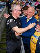 21 July 2024; Clare manager Brian Lohan, left, celebrates with two time All-Ireland winning Clare manager Ger Loughnane after the GAA Hurling All-Ireland Senior Championship Final between Clare and Cork at Croke Park in Dublin. Photo by Stephen McCarthy/Sportsfile