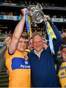 21 July 2024; Shane O'Donnell of Clare and two time All-Ireland winning Clare manager Ger Loughnane celebrate with the Liam MacCarthy cup after the GAA Hurling All-Ireland Senior Championship Final between Clare and Cork at Croke Park in Dublin. Photo by Stephen McCarthy/Sportsfile
