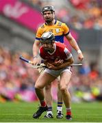 21 July 2024; Tony Kelly of Clare and Ger Mellerick of Cork tussle during the GAA Hurling All-Ireland Senior Championship Final between Clare and Cork at Croke Park in Dublin. Photo by David Fitzgerald/Sportsfile