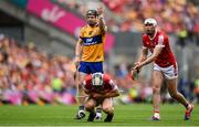 21 July 2024; Tony Kelly of Clare and Ger Mellerick of Cork tussle during the GAA Hurling All-Ireland Senior Championship Final between Clare and Cork at Croke Park in Dublin. Photo by David Fitzgerald/Sportsfile