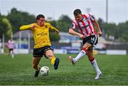 21 July 2024; Ben Doherty of Derry City in action against Kian Leavy of St Patrick's Athletic during the Sports Direct Men’s FAI Cup second round match between Derry City and St Patrick’s Athletic at the Ryan McBride Brandywell Stadium in Derry. Photo by Ben McShane/Sportsfile