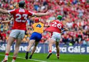 21 July 2024; Robbie O'Flynn of Cork has his jersey pulled by Conor Leen of Clare as he shoots for a score with the last shot in injury time during the GAA Hurling All-Ireland Senior Championship Final between Clare and Cork at Croke Park in Dublin. Photo by Brendan Moran/Sportsfile