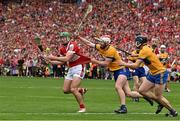 21 July 2024; Robbie O'Flynn of Cork shoots wide late in extra time whilst under pressure from Conor Leen and David McInerney of Clare during the GAA Hurling All-Ireland Senior Championship Final between Clare and Cork at Croke Park in Dublin. Photo by Sam Barnes/Sportsfile