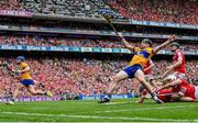 21 July 2024; Tony Kelly of Clare, right, collides with Cork goalkeeper Patrick Collins after scoring their side's third goal during the GAA Hurling All-Ireland Senior Championship Final match between Clare and Cork at Croke Park in Dublin. Photo by Seb Daly/Sportsfile