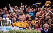 21 July 2024; A young Clare supporter celebrates before Clare captain Tony Kelly lifts the Liam MacCarthy Cup after their side's victory in during the GAA Hurling All-Ireland Senior Championship Final match between Clare and Cork at Croke Park in Dublin. Photo by Seb Daly/Sportsfile