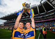 21 July 2024; Shane O'Donnell, left, and Paul Flanagan of Clare celebrate with the Liam MacCarthy cup after the GAA Hurling All-Ireland Senior Championship Final between Clare and Cork at Croke Park in Dublin. Photo by Stephen McCarthy/Sportsfile