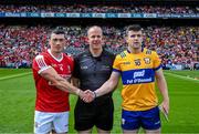 21 July 2024; Referee Johnny Murphy with the two captains, Sean O'Donoghue of Cork and Tony Kelly of Clare before the GAA Hurling All-Ireland Senior Championship Final between Clare and Cork at Croke Park in Dublin. Photo by Ray McManus/Sportsfile