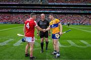21 July 2024; Referee Johnny Murphy with the two captains, Sean O'Donoghue of Cork and Tony Kelly of Clare before the GAA Hurling All-Ireland Senior Championship Final between Clare and Cork at Croke Park in Dublin. Photo by Ray McManus/Sportsfile
