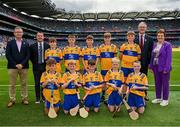 21 July 2024; The Clare team, back row from left, Conrad Healy, St Patrick's NS, Cary, Sligo, Samuel Dolan, Kildalkey NS, Kildalkey, Meath, Darragh Pettitt, Murrintown NS, Murrintown, Wexford, James Nea, Scoil Mhuire, Loughegar, Mullingar, Westmeath, and Mikey Loughnane, Castleiney NS, Templemore, Tipperary, and front row from left, Matthew Fallon, Tisrara NS, Four Roads, Roscommon, Ruairí McKiernan, St Brigid's NS, Drumcong, Leitrim, Joe Carr, St Patrick's NS, Ballinagh, Cavan, Leo McDermott, St Paul's PS, Irvinestown, Fermanagh, and Cathal Lyons, Scoil Mhuire na nGael, Dundalk, Louth, with from left, President of Cumann na mBunscol Gary Farrell, Uachtarán an Cumann Camógaíochta Brian Molloy, Uachtarán Chumann Lúthchleas Gael Jarlath Burns and INTO President Carmel Browne,  before the GAA INTO Cumann na mBunscol Respect Exhibition Go Games at the GAA Hurling All-Ireland Senior Championship final between Clare and Cork at Croke Park in Dublin. Photo by Sam Barnes/Sportsfile