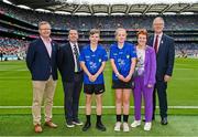 21 July 2024; Referee Oisín Moran, St Mary's BNS, Rathfarnham, Dublin, and Referee Sadhbh Mention, Scoil Treasa, Firhouse, Dublin, with from left, Uachtarán an Cumann Camógaíochta Brian Molloy, President of Cumann na mBunscol Gary Farrell,  INTO President Carmel Browne and Uachtarán Chumann Lúthchleas Gael Jarlath Burns, before the GAA INTO Cumann na mBunscol Respect Exhibition Go Games at the GAA Hurling All-Ireland Senior Championship final between Clare and Cork at Croke Park in Dublin. Photo by Sam Barnes/Sportsfile