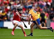 21 July 2024; Mikey Loughnane, Castleiney NS, Templemore, Tipperary, representing Clare, in action against Riain Casey, Our Lady of Mercy NS, Stradbally, Co Waterford, representing Cork, during the GAA INTO Cumann na mBunscol Respect Exhibition Go Games at the GAA Hurling All-Ireland Senior Championship final between Clare and Cork at Croke Park in Dublin. Photo by Sam Barnes/Sportsfile