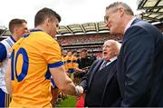 21 July 2024; President of Ireland Michael D Higgins shakes hands with Tony Kelly of Clare, alongside Uachtarán Chumann Lúthchleas Gael Jarlath Burns before the GAA Hurling All-Ireland Senior Championship Final between Clare and Cork at Croke Park in Dublin. Photo by Sam Barnes/Sportsfile