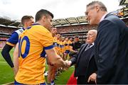 21 July 2024; President of Ireland Michael D Higgins shakes hands with Tony Kelly of Clare, alongside Uachtarán Chumann Lúthchleas Gael Jarlath Burns before the GAA Hurling All-Ireland Senior Championship Final between Clare and Cork at Croke Park in Dublin. Photo by Sam Barnes/Sportsfile