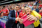 21 July 2024; Sean Óg Ó hAilpín, a member of the Cork 1999 All-Ireland winning jubilee team, poses with supporters before the GAA Hurling All-Ireland Senior Championship Final between Clare and Cork at Croke Park in Dublin. Photo by Stephen McCarthy/Sportsfile