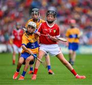 21 July 2024; Matthew Fallon, Tisrara NS, Four Roads, Roscommon, representing Clare and Riain Casey, Our Lady of Mercy NS, Stradbally, Waterford, representing Cork during the GAA INTO Cumann na mBunscol Respect Exhibition Go Games at the GAA Hurling All-Ireland Senior Championship final between Clare and Cork at Croke Park in Dublin. Photo by Ray McManus/Sportsfile