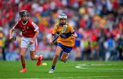 21 July 2024; Samuel Dolan, Kildalkey NS, Kildalkey, Meath, representing Clare and Riain Casey, Our Lady of Mercy NS, Stradbally, Co Waterford, representing Cork during the GAA INTO Cumann na mBunscol Respect Exhibition Go Games at the GAA Hurling All-Ireland Senior Championship final between Clare and Cork at Croke Park in Dublin. Photo by Ray McManus/Sportsfile