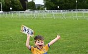 22 July 2024; Clare supporter Jason Healy, three years, from Kilmaley before the homecoming celebrations of the All-Ireland Senior Hurling Champions at Active Ennis Tim Smythe Park in Clare. Photo by Piaras Ó Mídheach/Sportsfile