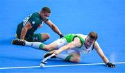24 July 2024; Sean Murray of Team Ireland in action against Keenan Horne of Team South Africa during the a Men's Hockey warm up match between Ireland and South Africa at the Yves-du-Manoir Stadium during the 2024 Paris Summer Olympic Games in Paris, France. Photo by Stephen McCarthy/Sportsfile