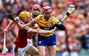 21 July 2024; John Conlon of Clare in action against Shane Barrett of Cork during the GAA Hurling All-Ireland Senior Championship Final between Clare and Cork at Croke Park in Dublin. Photo by Piaras Ó Mídheach/Sportsfile