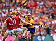 21 July 2024; John Conlon of Clare in action against Shane Barrett of Cork during the GAA Hurling All-Ireland Senior Championship Final between Clare and Cork at Croke Park in Dublin. Photo by Piaras Ó Mídheach/Sportsfile