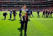 21 July 2024; Mark Landers of the Cork hurling jubilee 1999 All Ireland winning team beings out the Liam MacCarthy cup before the GAA Hurling All-Ireland Senior Championship Final between Clare and Cork at Croke Park in Dublin. Photo by Brendan Moran/Sportsfile