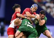 24 July 2024; Moeki Fukushi and Kippei Taninaka, left, of Team Japan in action against Gavin Mullin and Andrew Smith, right, of Team Irelandduring the Men's Rugby Sevens Pool A match between Team Ireland and Team Japan at the Stade de France during the 2024 Paris Summer Olympic Games in Paris, France. Photo by Stephen McCarthy/Sportsfile