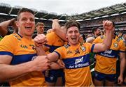 21 July 2024; Ian Galvin of Clare, centre, celebrates with team-mates, including John Conlon, left, during the GAA Hurling All-Ireland Senior Championship Final between Clare and Cork at Croke Park in Dublin. Photo by Sam Barnes/Sportsfile