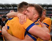 21 July 2024; Shane O'Donnell of Clare, centre, celebrates with team-mate John Conlon after their side's victory in the GAA Hurling All-Ireland Senior Championship Final between Clare and Cork at Croke Park in Dublin. Photo by Sam Barnes/Sportsfile