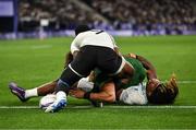 25 July 2024; Chay Mullins of Team Ireland scores his side's opening try during the Men's Rugby Sevens Quarter-Final  match between Team Fiji and Team Ireland at the Stade de France during the 2024 Paris Summer Olympic Games in Paris, France. Photo by Brendan Moran/Sportsfile