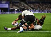 25 July 2024; Chay Mullins of Team Ireland scores his side's opening try during the Men's Rugby Sevens Quarter-Final  match between Team Fiji and Team Ireland at the Stade de France during the 2024 Paris Summer Olympic Games in Paris, France. Photo by Brendan Moran/Sportsfile