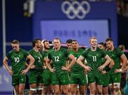 25 July 2024; Team Ireland players, from left, Terry Kennedy, Harry McNulty, Niall Comerford, Jordan Conroy and Gavin Mullin after defeat in the Men's Rugby Sevens Quarter-Final match between Team Fiji and Team Ireland at the Stade de France during the 2024 Paris Summer Olympic Games in Paris, France. Photo by Brendan Moran/Sportsfile