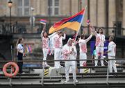 26 July 2024; Team Armenia flagbearer Davit Chaloyan during the Opening Ceremony of the 2024 Paris Summer Olympic Games on the banks of the river Seine in Paris, France. Photo by Stephen McCarthy/Sportsfile